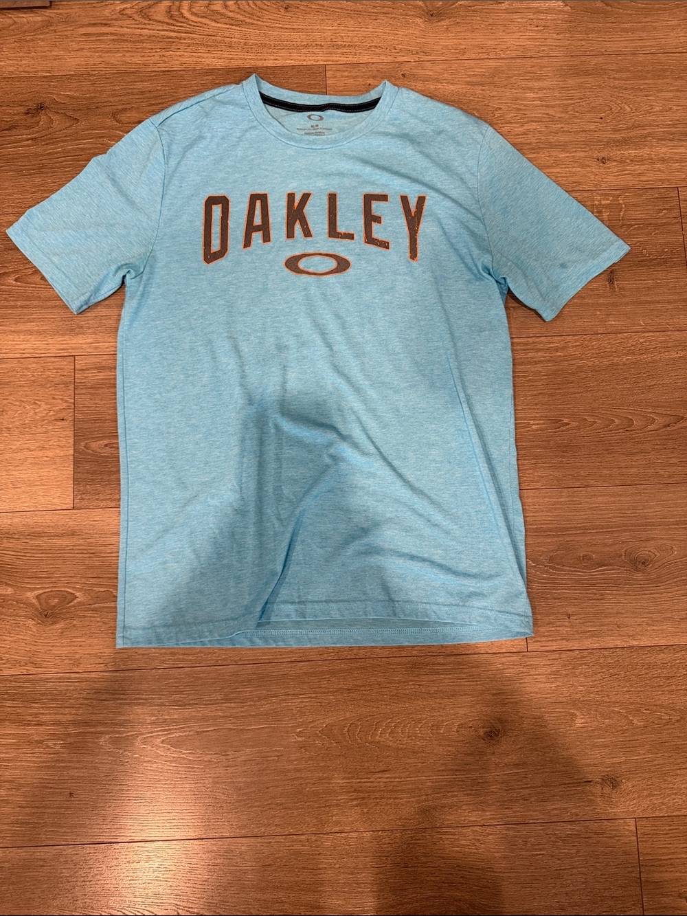 Oakley Men's Sky Blue Graphic Logo Tee with Brown Print
